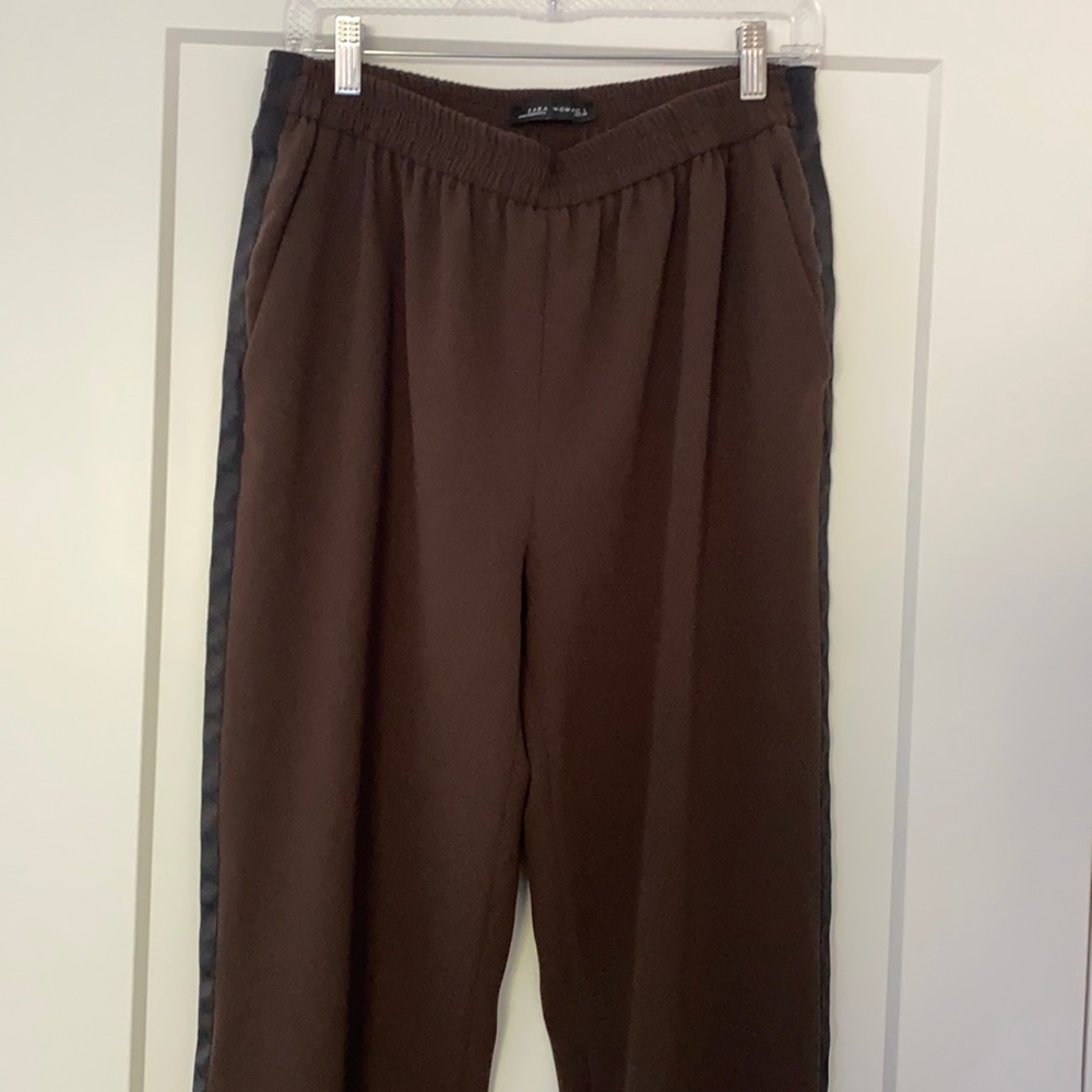 Brown dress pant with banded waist and black tuxedo stripe